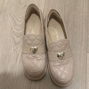 CHANEL Quilted Beige Loafers with Gold Accent